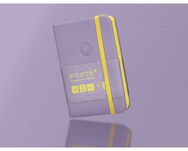 Cuaderno con gomilla antartik notes tapa dura a7 hojas lisas morado y amarillo 80 hojas 80 gr fsc