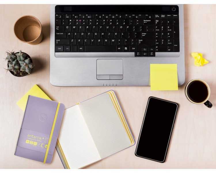 Cuaderno con gomilla antartik notes tapa dura a6 hojas cuadricula morado y amarillo 100 hojas 80 gr fsc