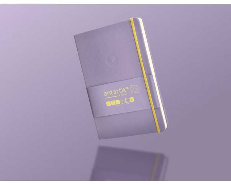 Cuaderno con gomilla antartik notes tapa dura a5 hojas cuadricula morado y amarillo 100 hojas 80 gr fsc