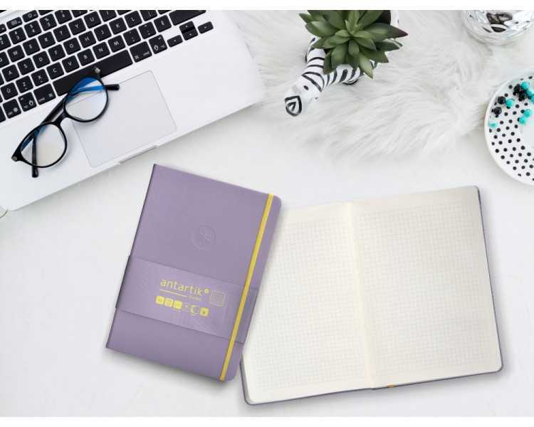 Cuaderno con gomilla antartik notes tapa dura a5 hojas cuadricula morado y amarillo 100 hojas 80 gr fsc