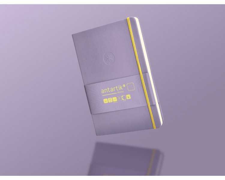 Cuaderno con gomilla antartik notes tapa dura a5 hojas puntos morado y amarillo 100 hojas 80 gr fsc