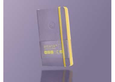 Cuaderno con gomilla antartik notes tapa blanda a6 hojas lisas morado y amarillo 100 hojas 80 gr fsc