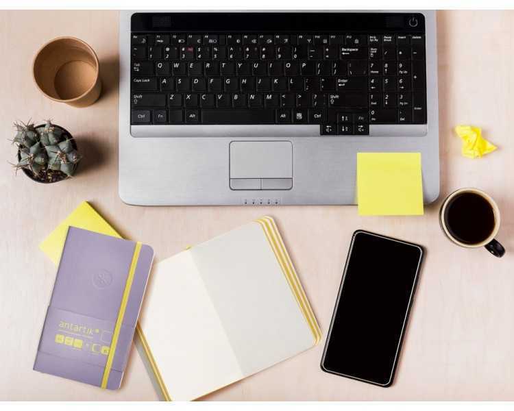 Cuaderno con gomilla antartik notes tapa blanda a6 hojas lisas morado y amarillo 100 hojas 80 gr fsc