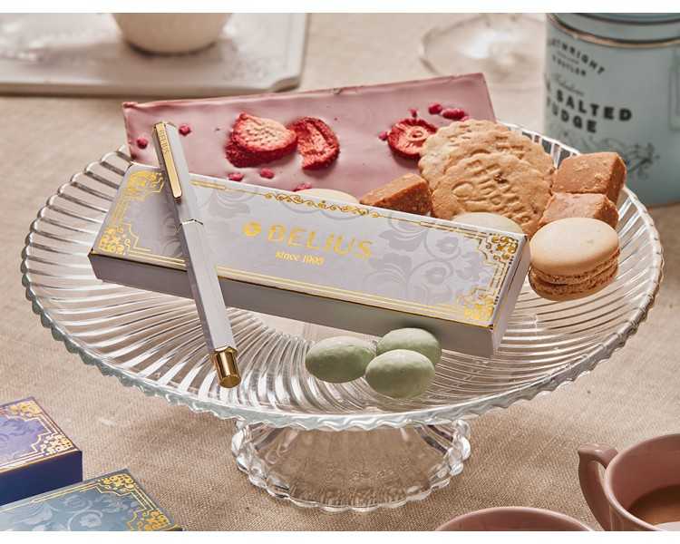 Boligrafo belius macaron bliss forma hexagonal color blanco y dorado tinta azul caja de diseño